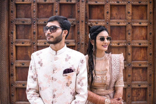 Woman wearing an emerald green Banarasi brocade kurta pant set, styled as a wedding guest at an Indian celebration in Australia